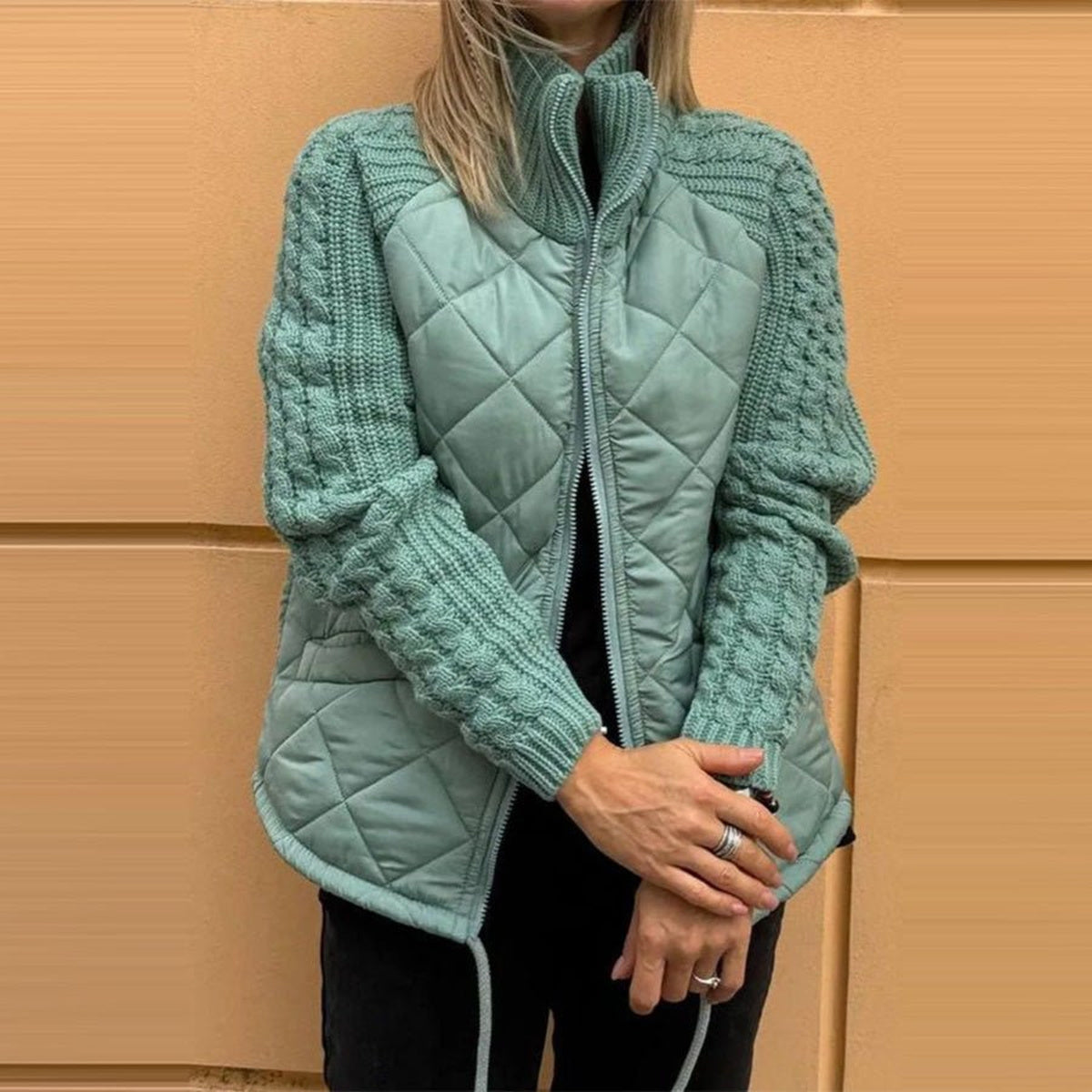 Quilted Knit-Sleeve Funnel Jacket in blue-green, front view on a model