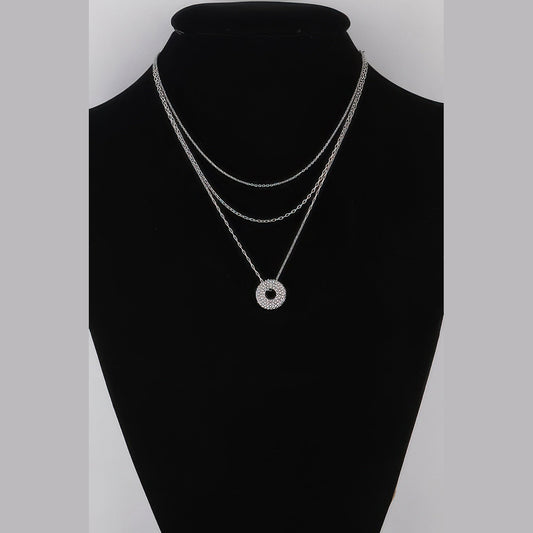 Jeweled Circle Layered Necklace in silver with clear stones, displayed on a necklace bust