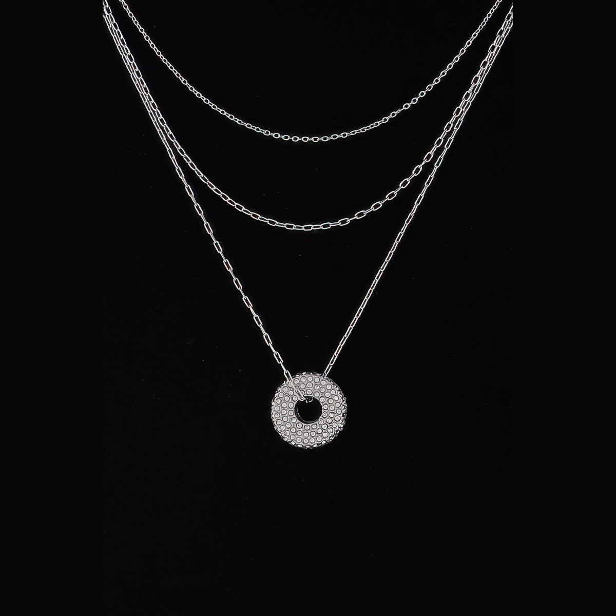 Jeweled Circle Layered Necklace in silver with clear stones, circle pendant close-up