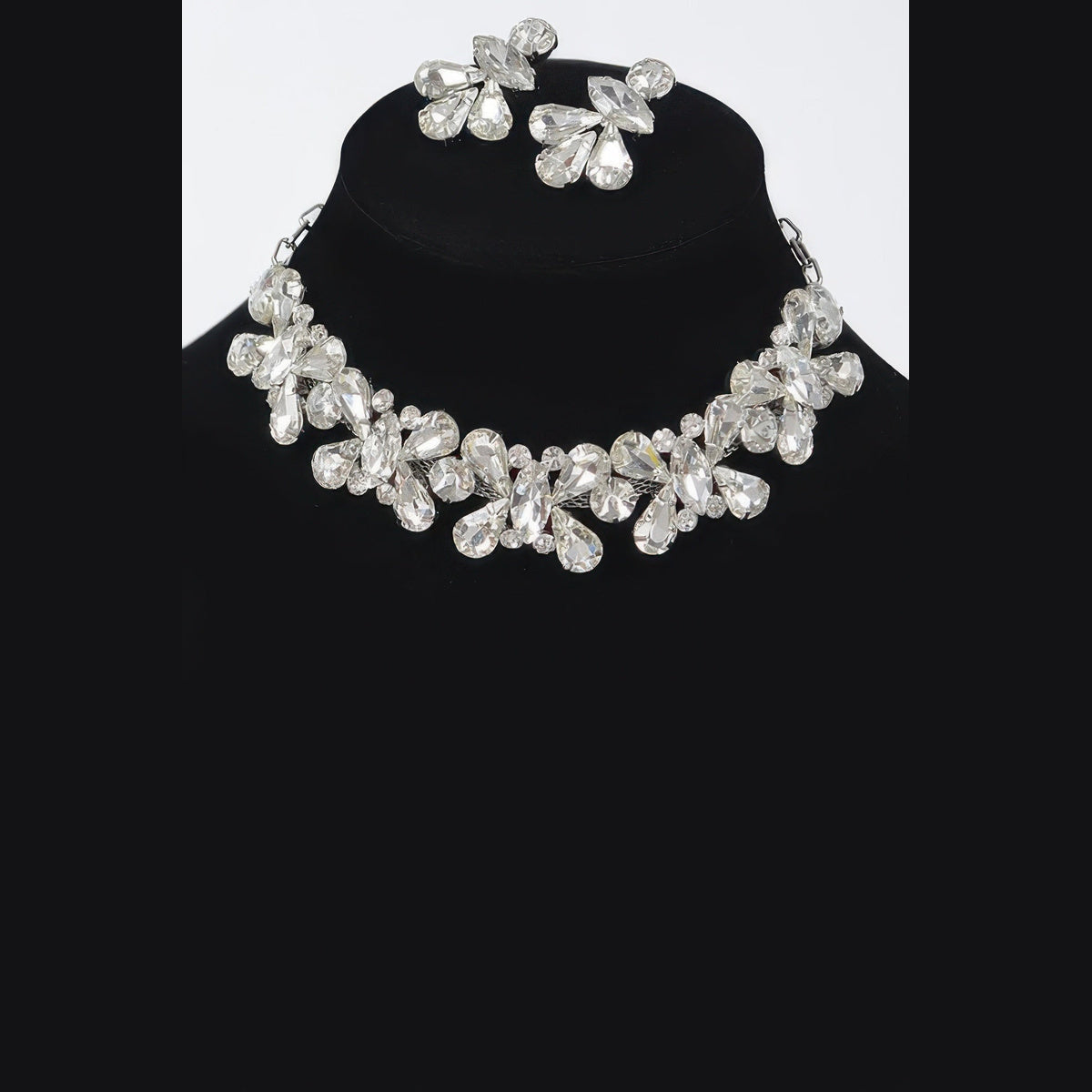 Floral Stone Necklace & Earring Set in silver with clear stones, necklace and earrings displayed together