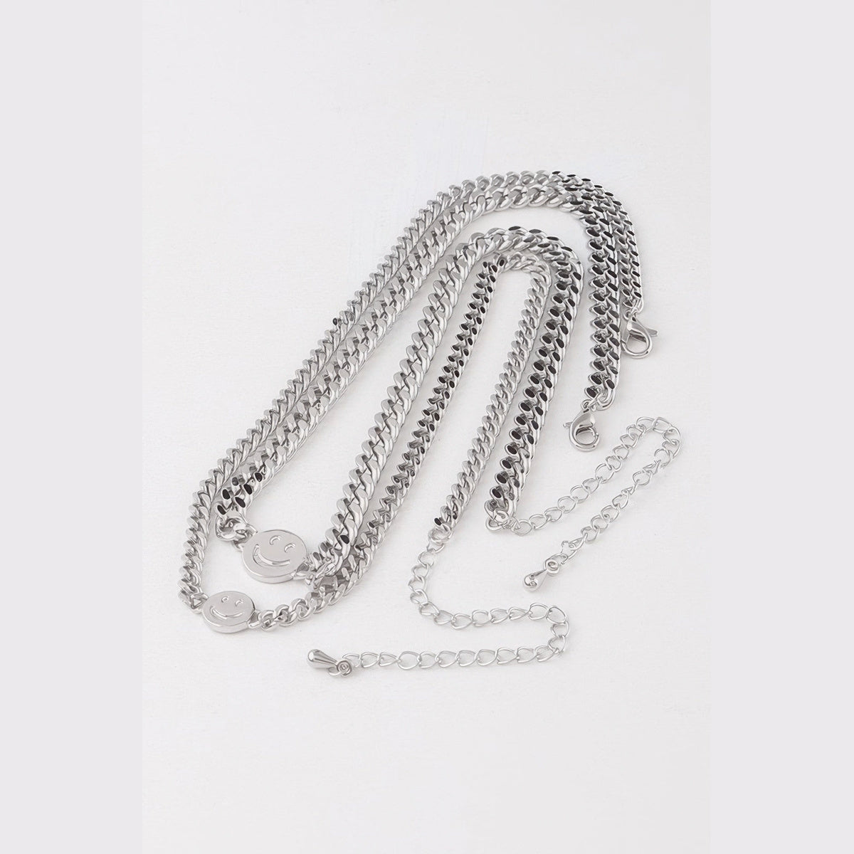 Smiley Disc Double-Chain Choker in silver, flat lay