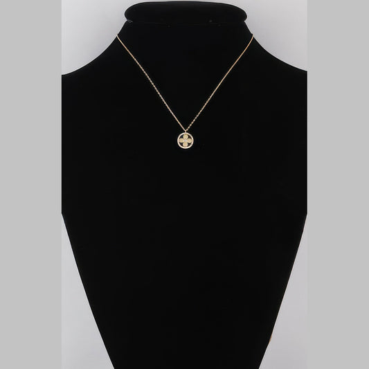 Jeweled Clover Pendant Necklace in gold with clear stones, displayed on a necklace bust