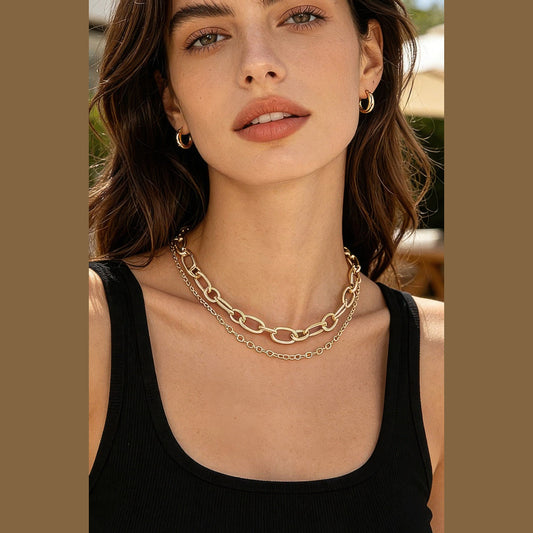 Polished Oval-Link Layered Necklace in gold, styled on a model
