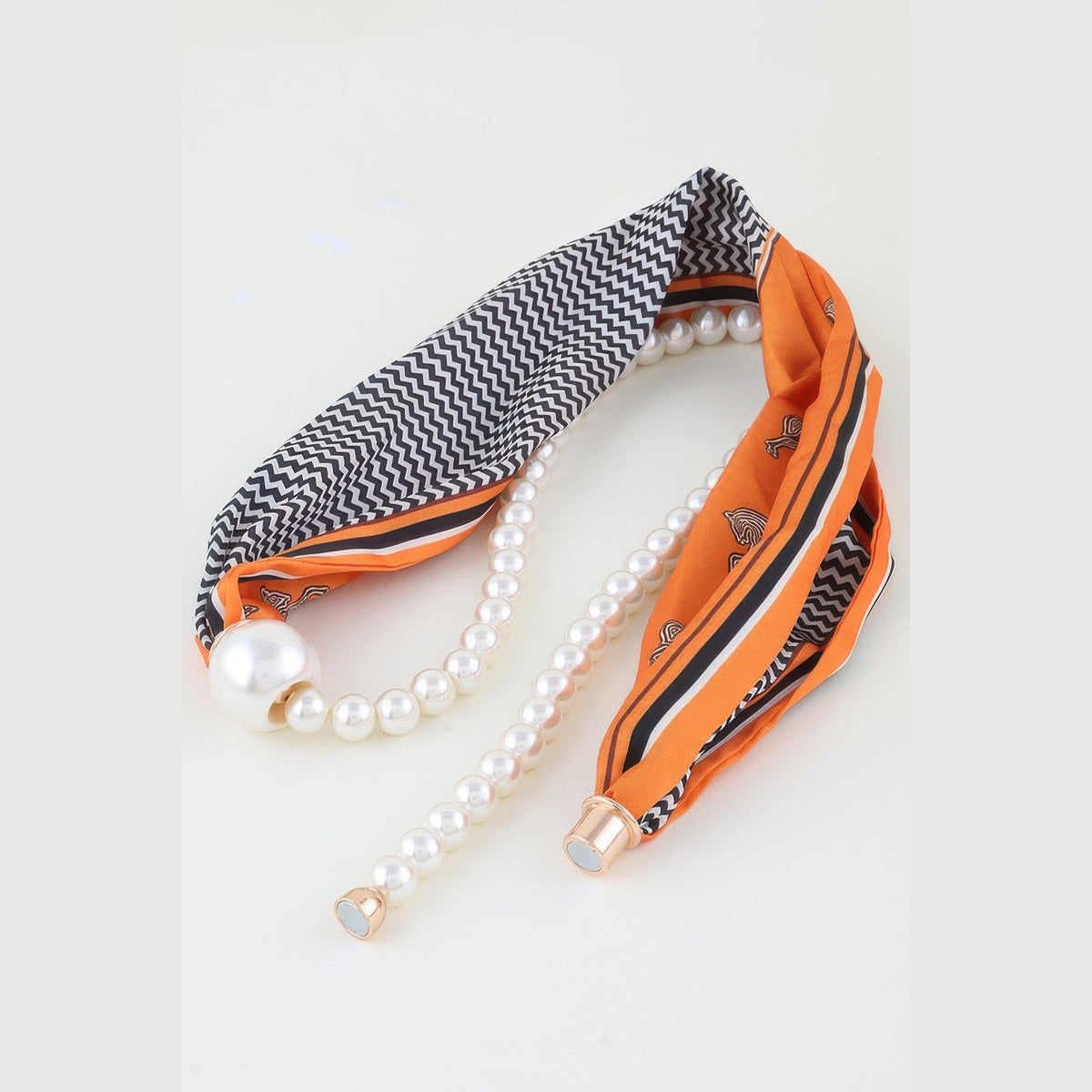 Scarf & Pearl-Effect Statement Necklace in orange, scarf and pearls flat lay