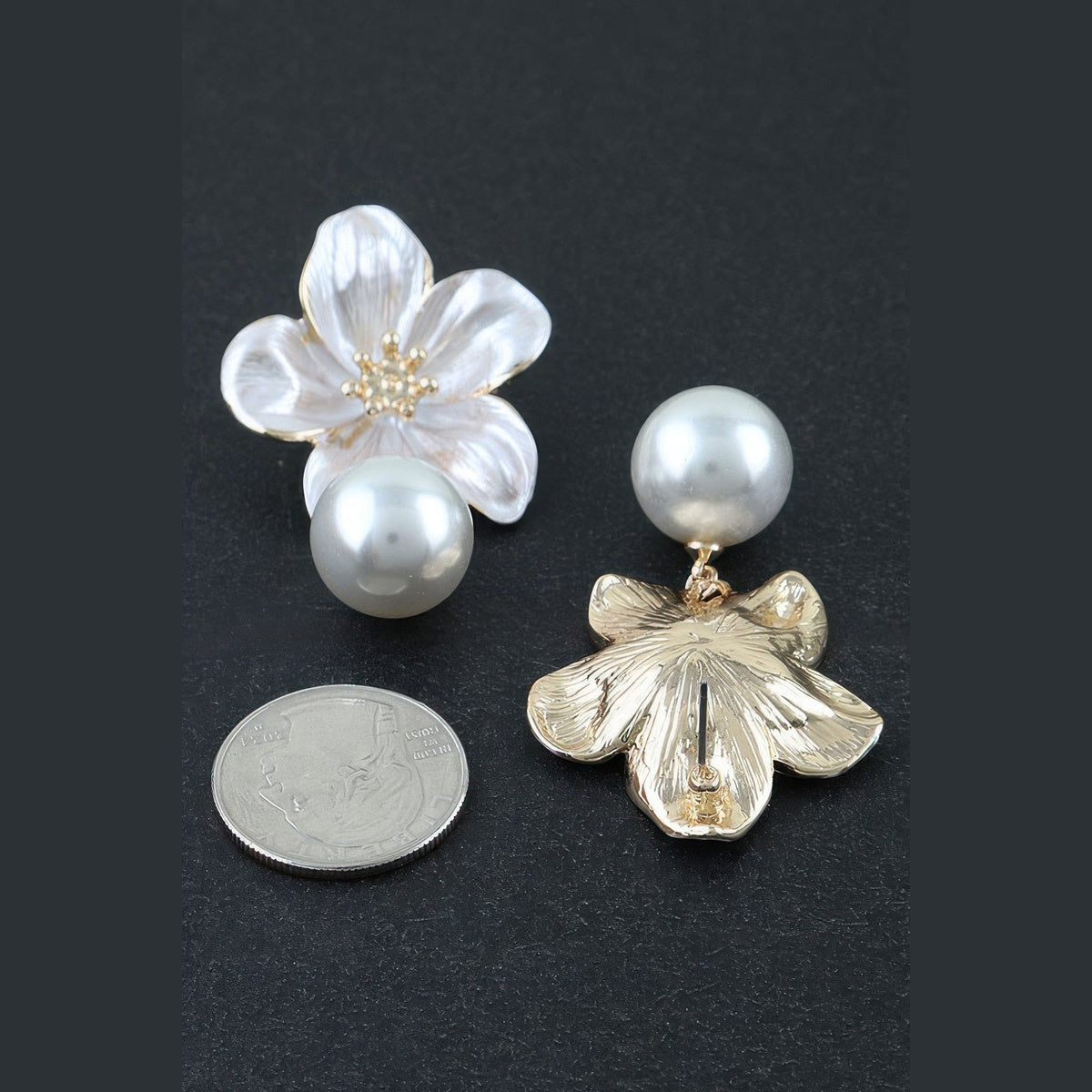 Pearl-Effect Flower Drop Earrings in gold and pearl white, front and reverse views beside a coin for scale