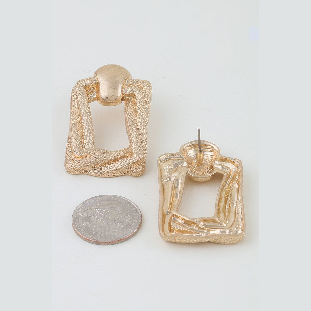 Braided Door-Knocker Earrings in gold, front and reverse views beside a coin for scale