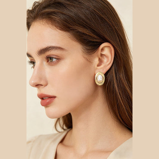 Layered Oval Pearl-Effect Stud Earrings in gold and pearl white, styled on a model