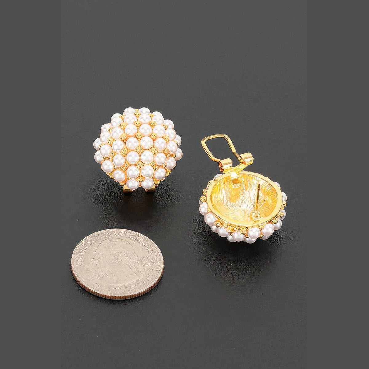 Pearl-Effect Cluster Clip-On Earrings in gold and cream, clip-on clasps beside a coin for scale