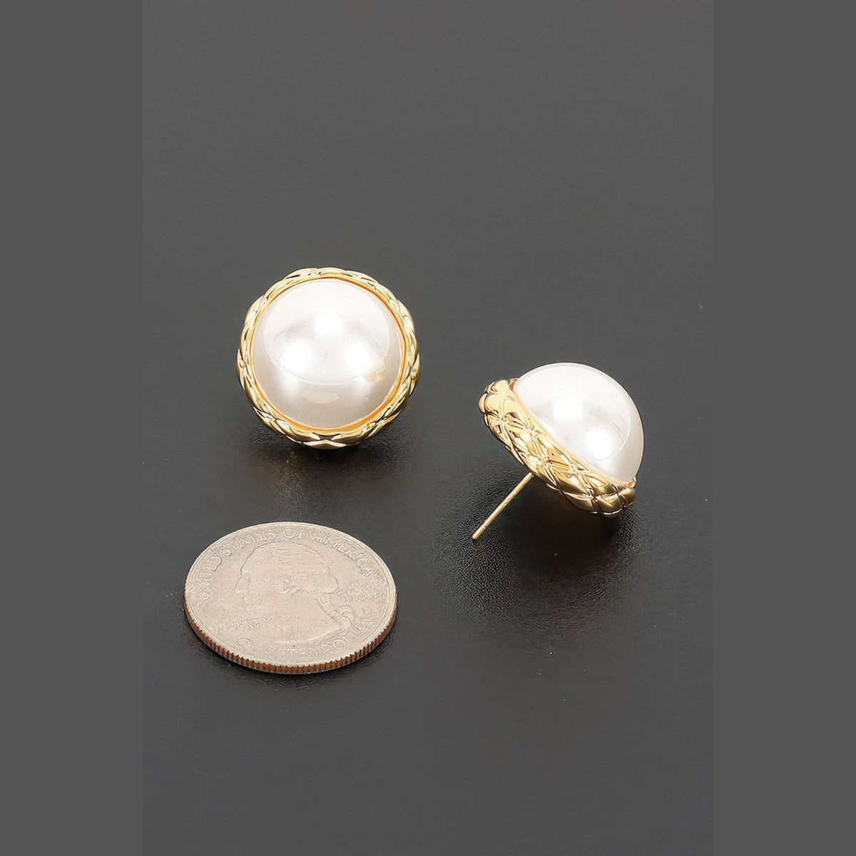 Braided Pearl-Effect Stud Earrings in gold and pearl white, earring posts and side profile beside a coin for scale