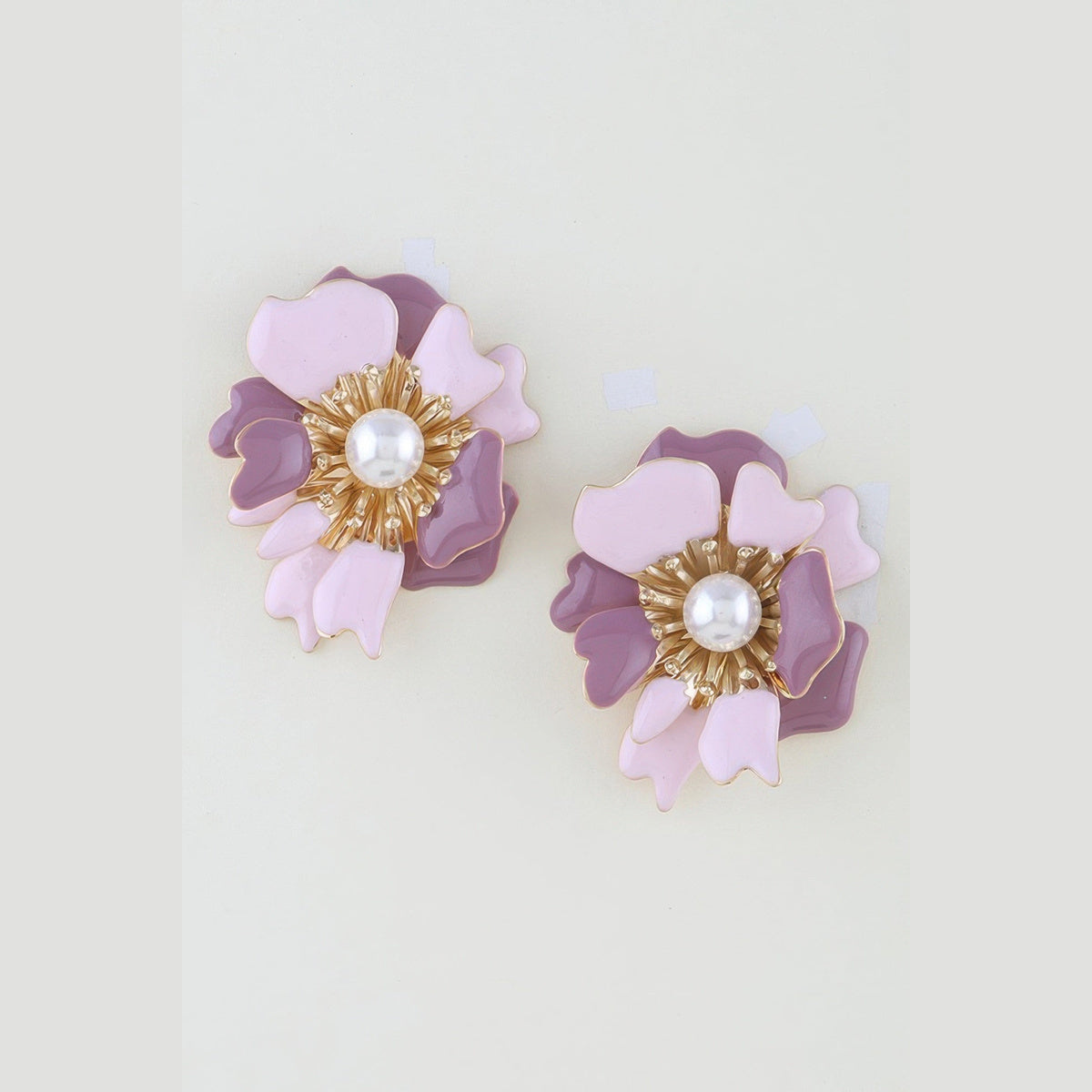Marbled Blossom Statement Earrings in gold and pink, pair shown from the front