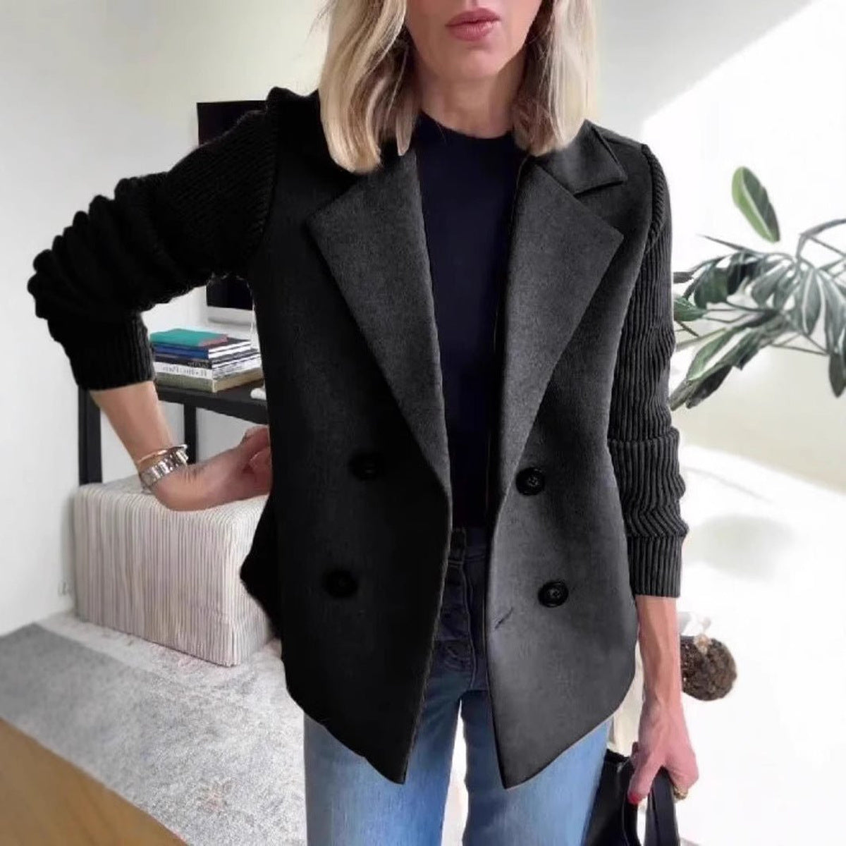 Double-Breasted Knit-Sleeve Jacket in black, front view on a model
