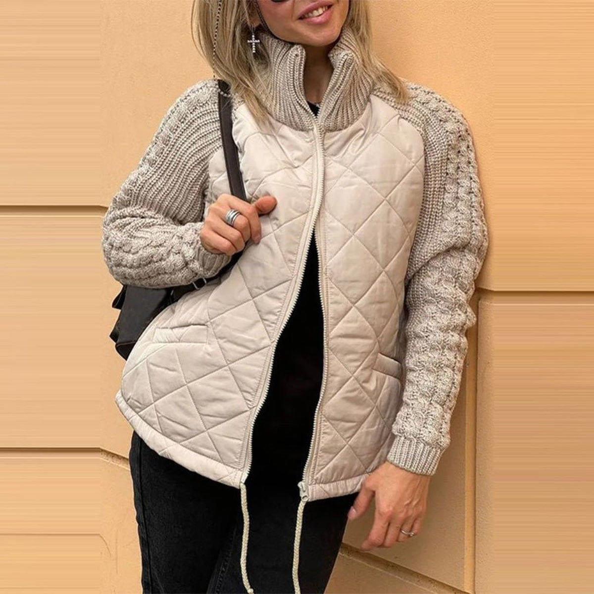 Quilted Knit-Sleeve Funnel Jacket in beige, front view on a model