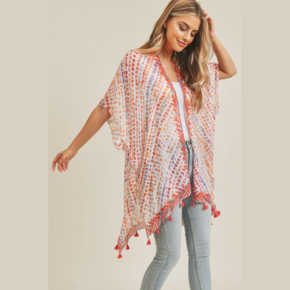 Dash-Print Tassel Kimono Layer in red and blue, tassel and sleeve detail