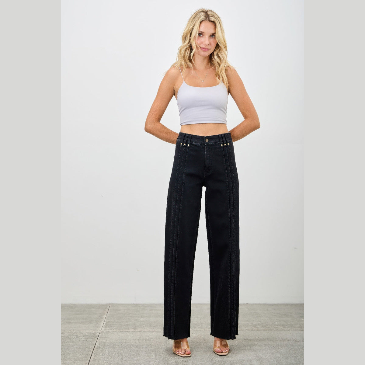 High-Rise Front-Seam Straight-Leg Jeans in black, back view on a model