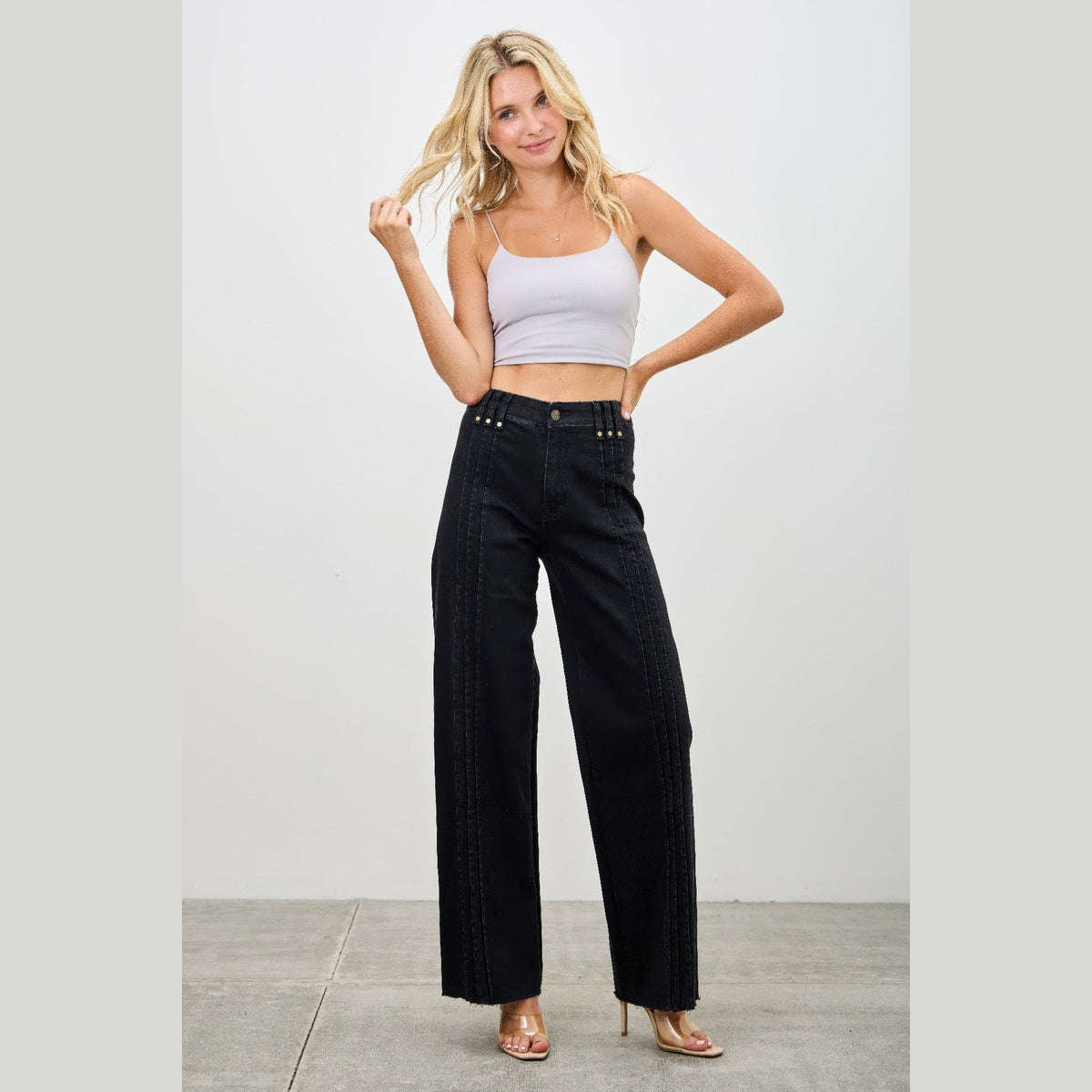 High-Rise Front-Seam Straight-Leg Jeans in black, front view on a model
