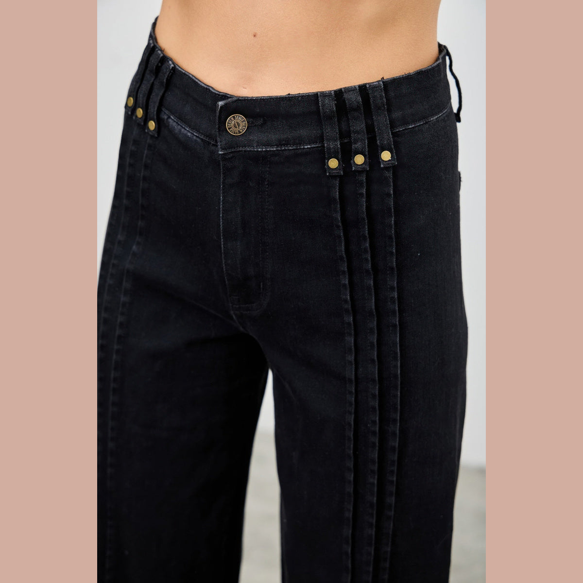 High-Rise Front-Seam Straight-Leg Jeans in black, seam and pocket detail
