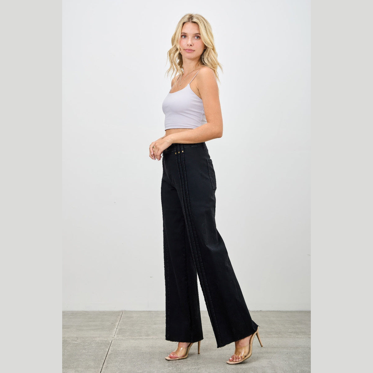 High-Rise Front-Seam Straight-Leg Jeans in black, side view