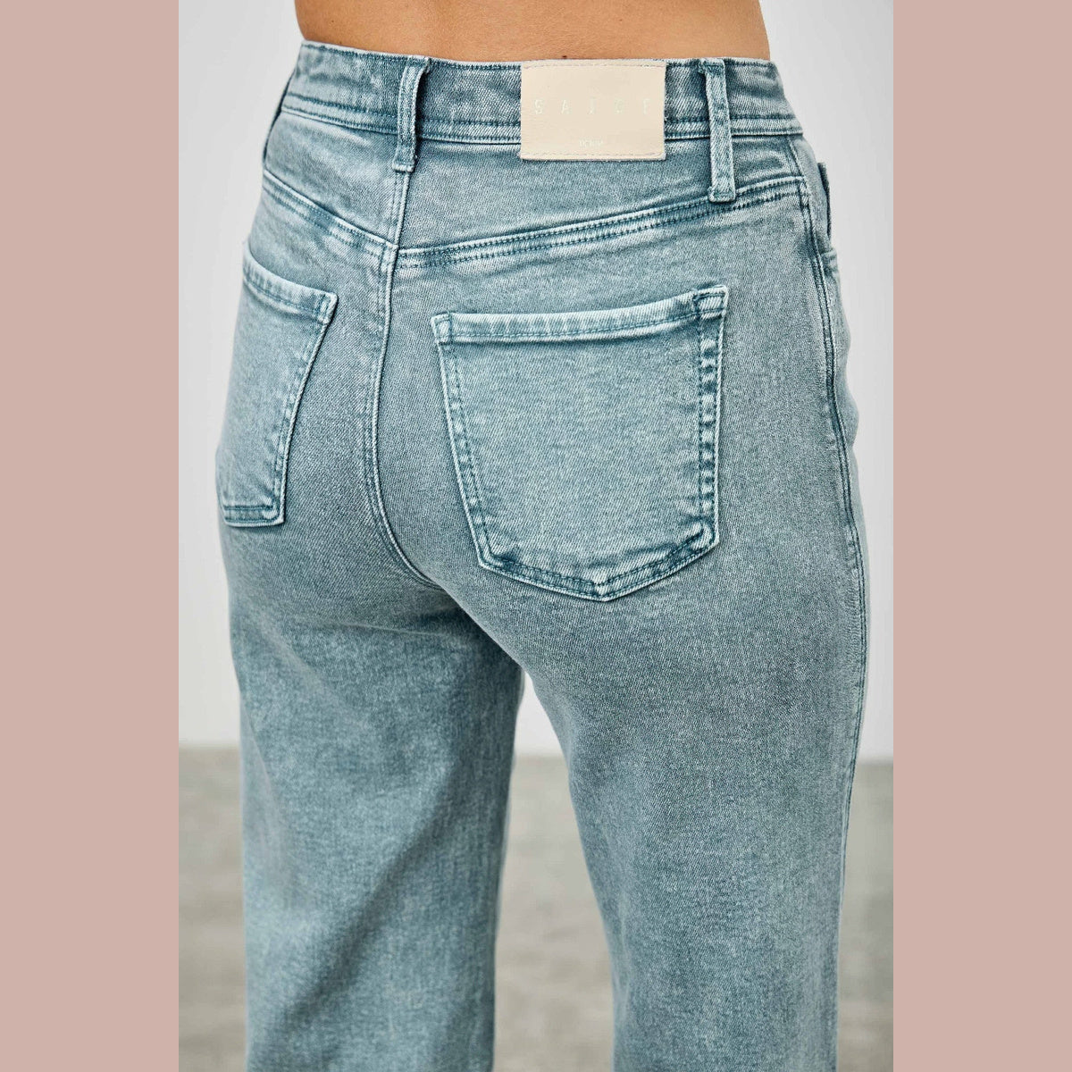 High-Rise Slim Wide-Leg Jeans in blue, back pocket detail