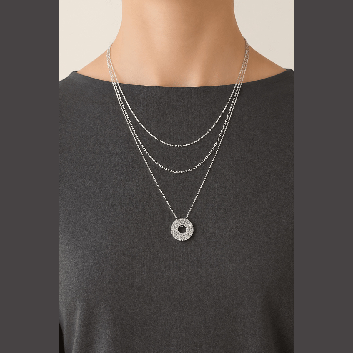 Jeweled Circle Layered Necklace in silver with clear stones, worn around the neck
