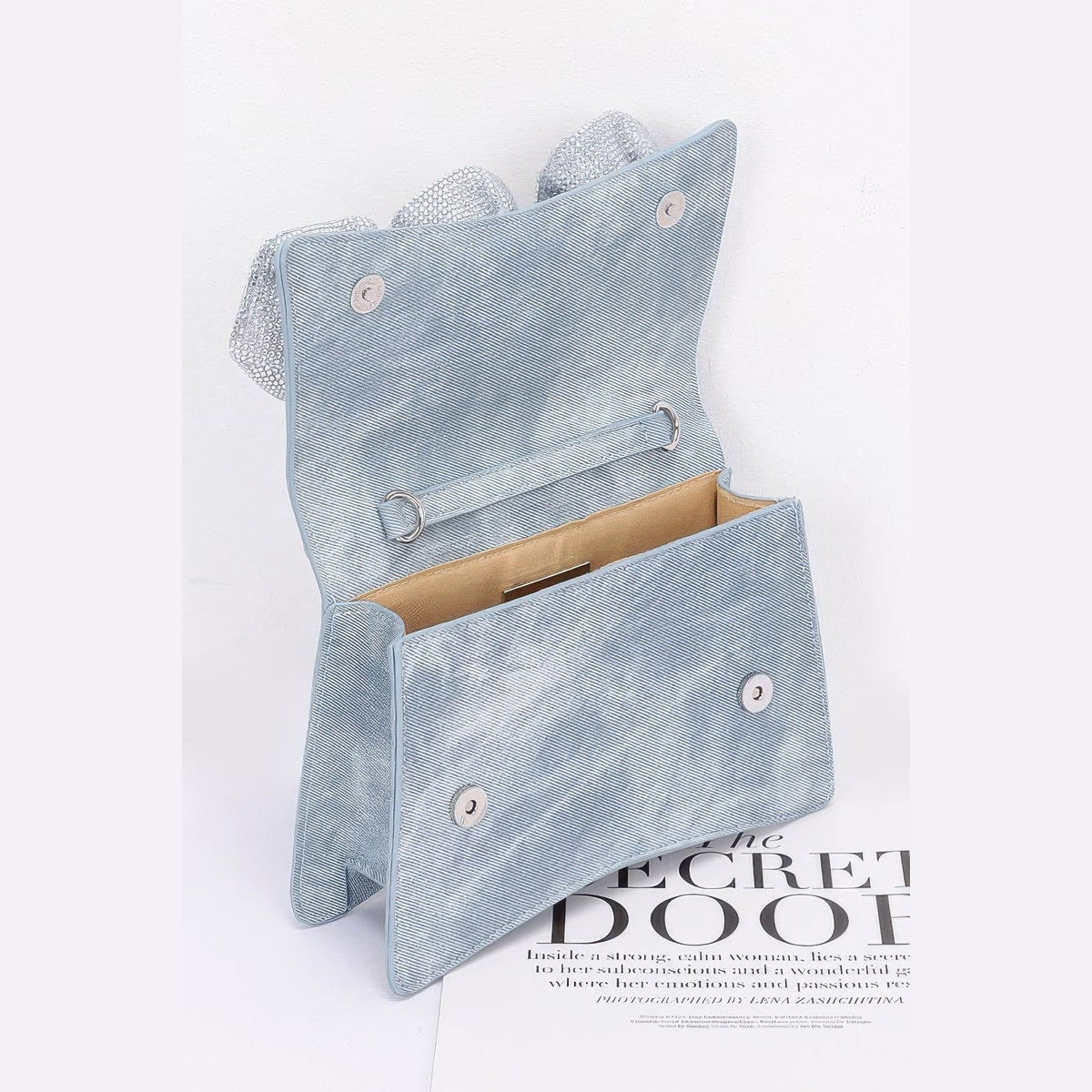 Rhinestone Flower Statement Bag in blue, open interior and fastening detail