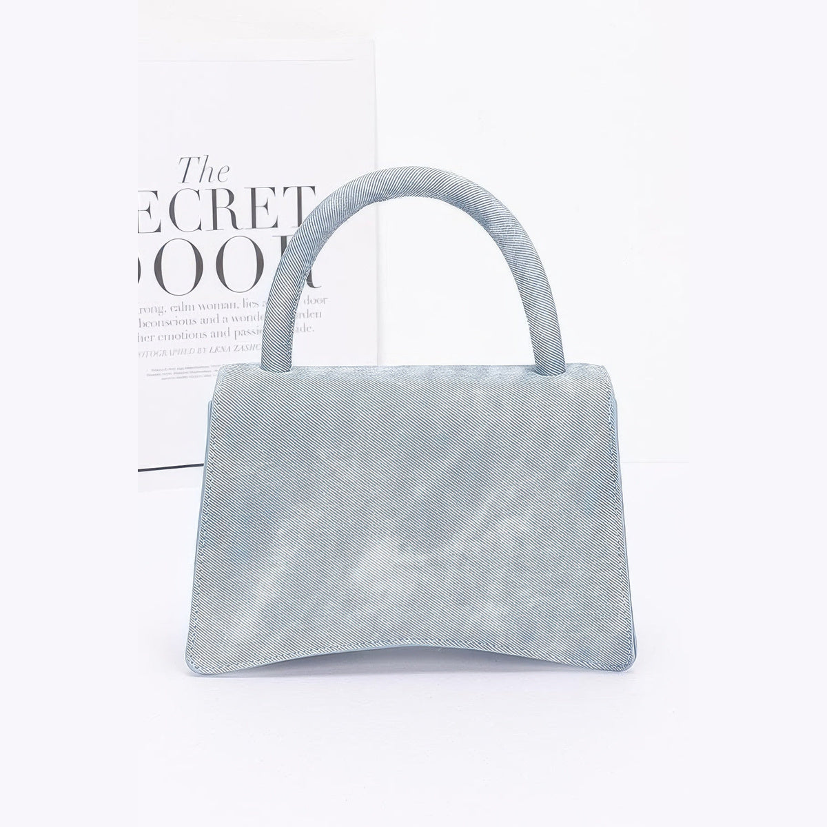 Rhinestone Flower Statement Bag in blue, rear view