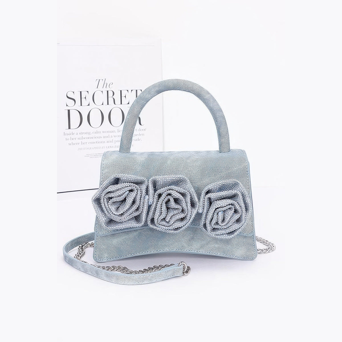 Rhinestone Flower Statement Bag in blue, front view with flower embellishments
