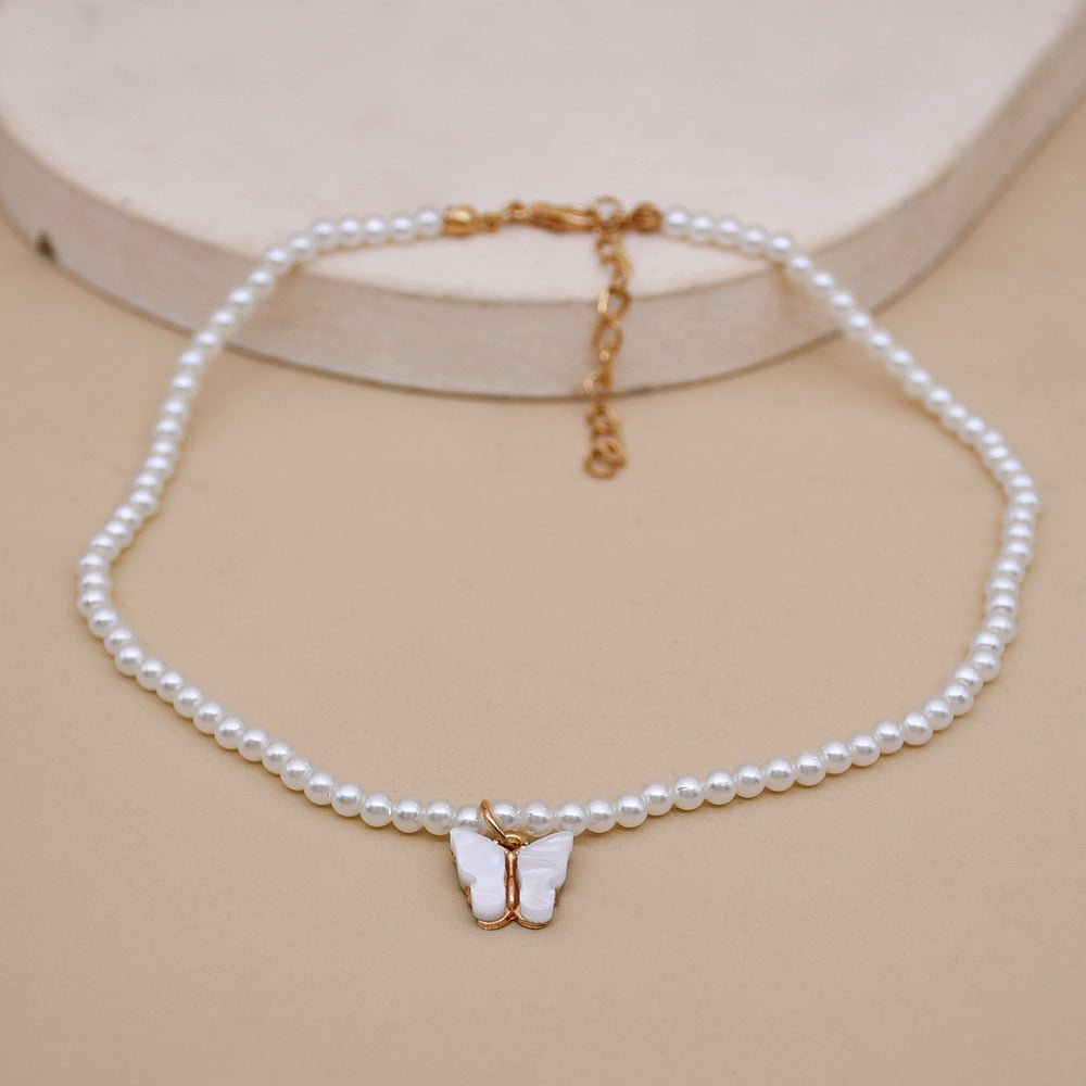 White Pearl Choker Necklace with Butterfly Pendant – Minimal Elegance | The Simple Co – Necklaces (Minimalist / Statement / Unis, minimalist style, quiet luxury aesthetic, modern essential – The Simple Co.