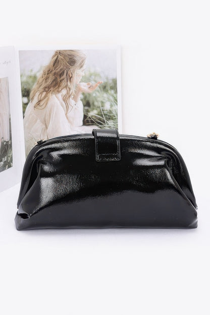 Glossy frame shoulder handbag detail view