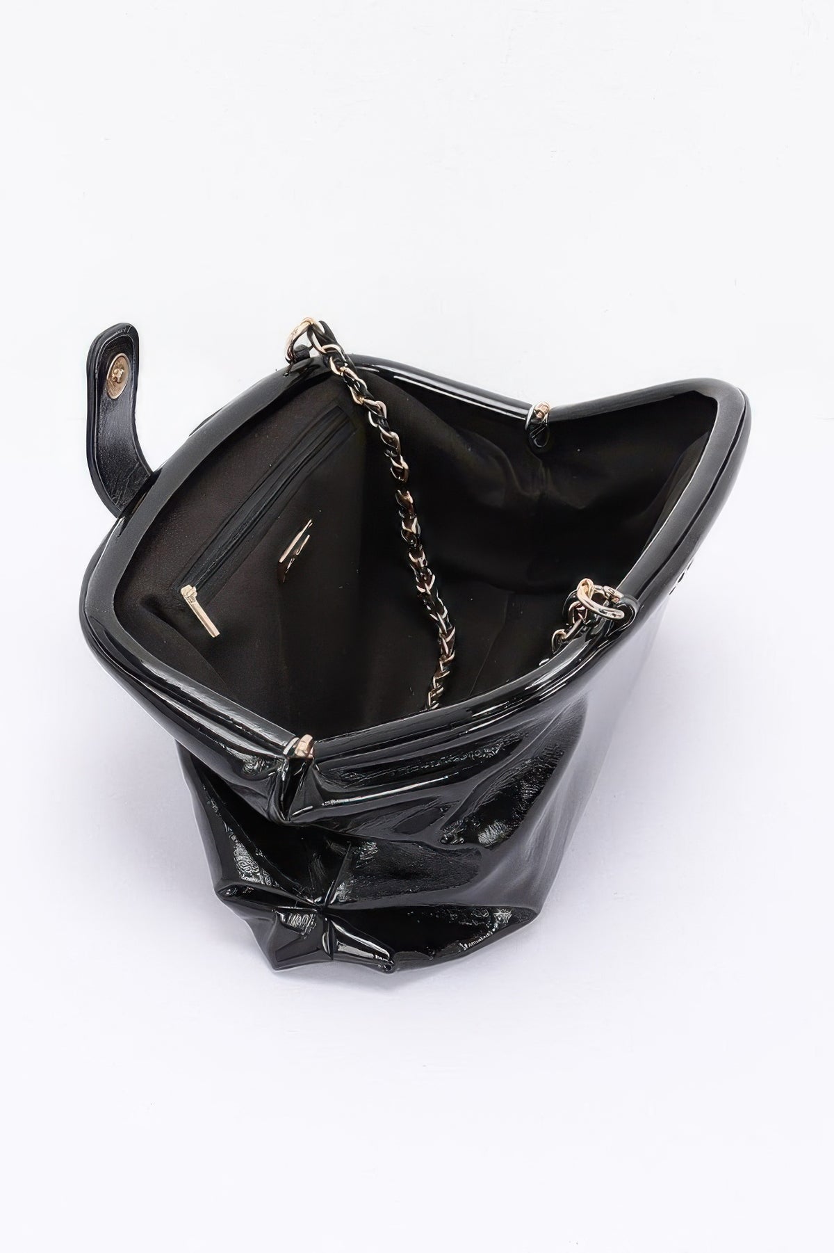 Glossy frame shoulder handbag detail view