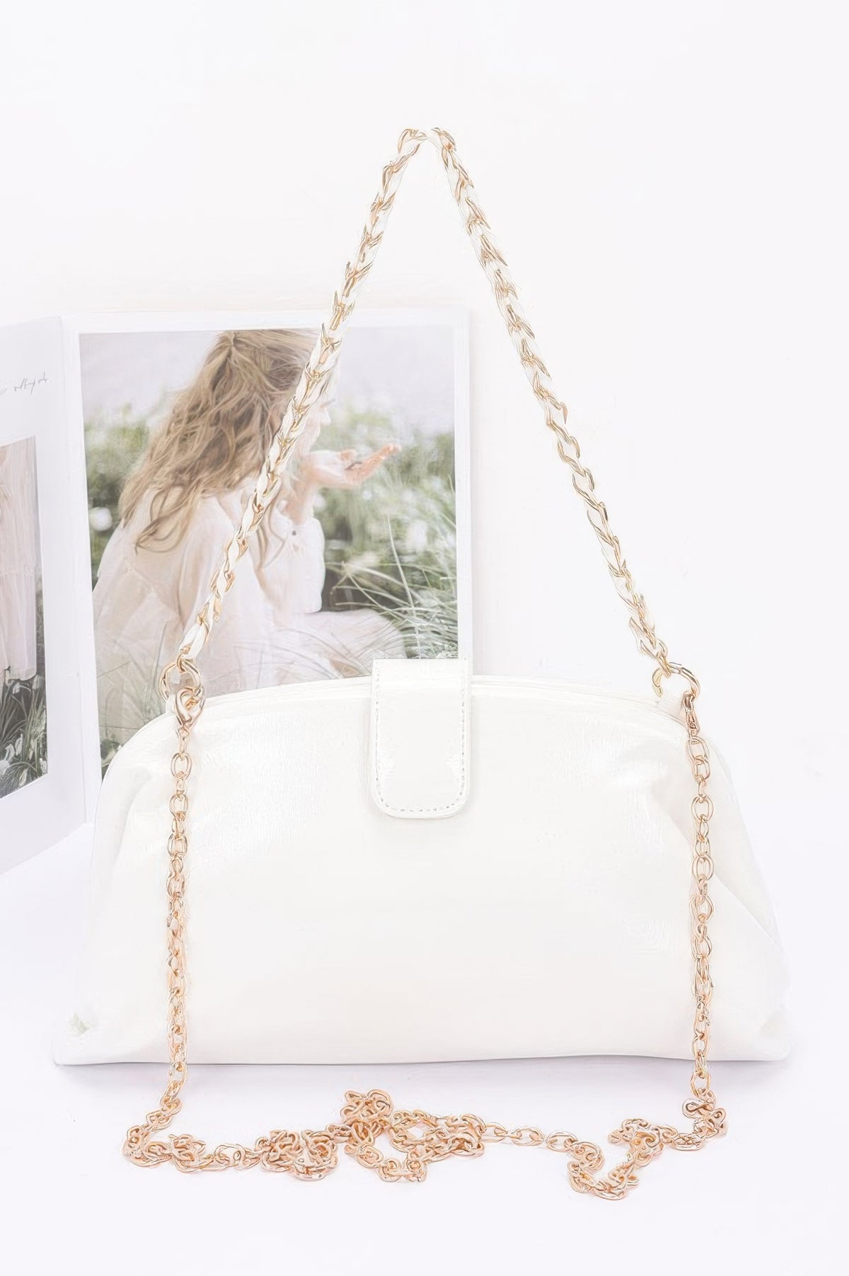 Glossy frame shoulder handbag detail view