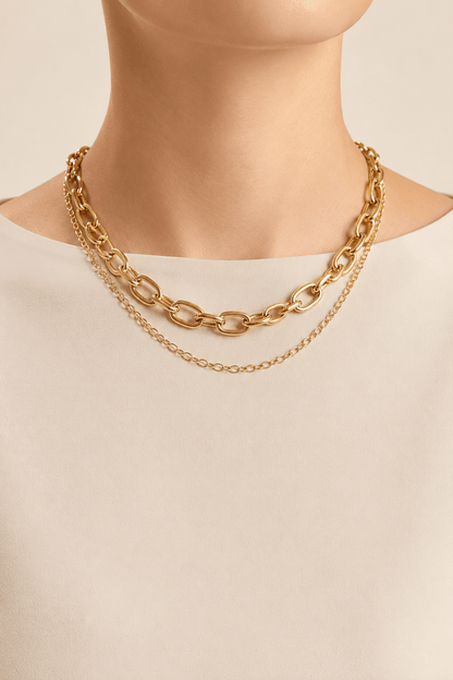 Polished oval-link layered necklace worn on a fair-light skin model