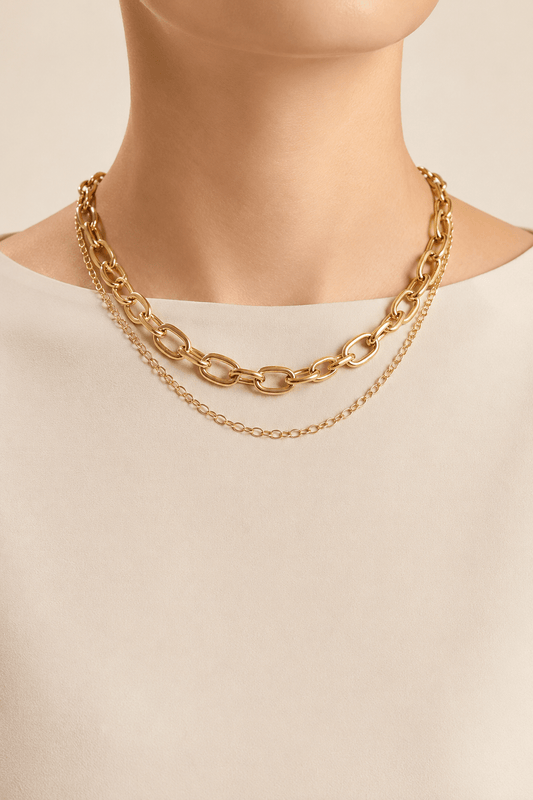 Polished oval-link layered necklace worn on a fair-light skin model