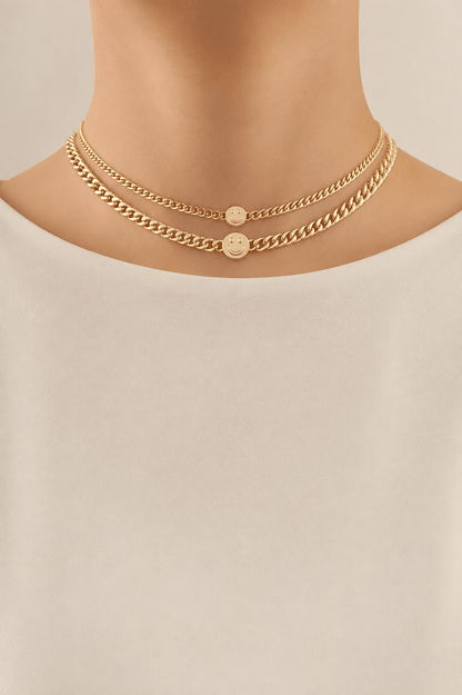 Smiley disc double-chain choker worn on a fair-light skin model