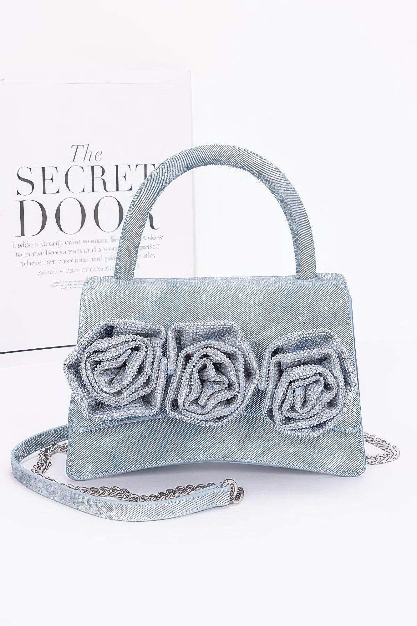 Rhinestone flower statement handbag by The Simple Co.