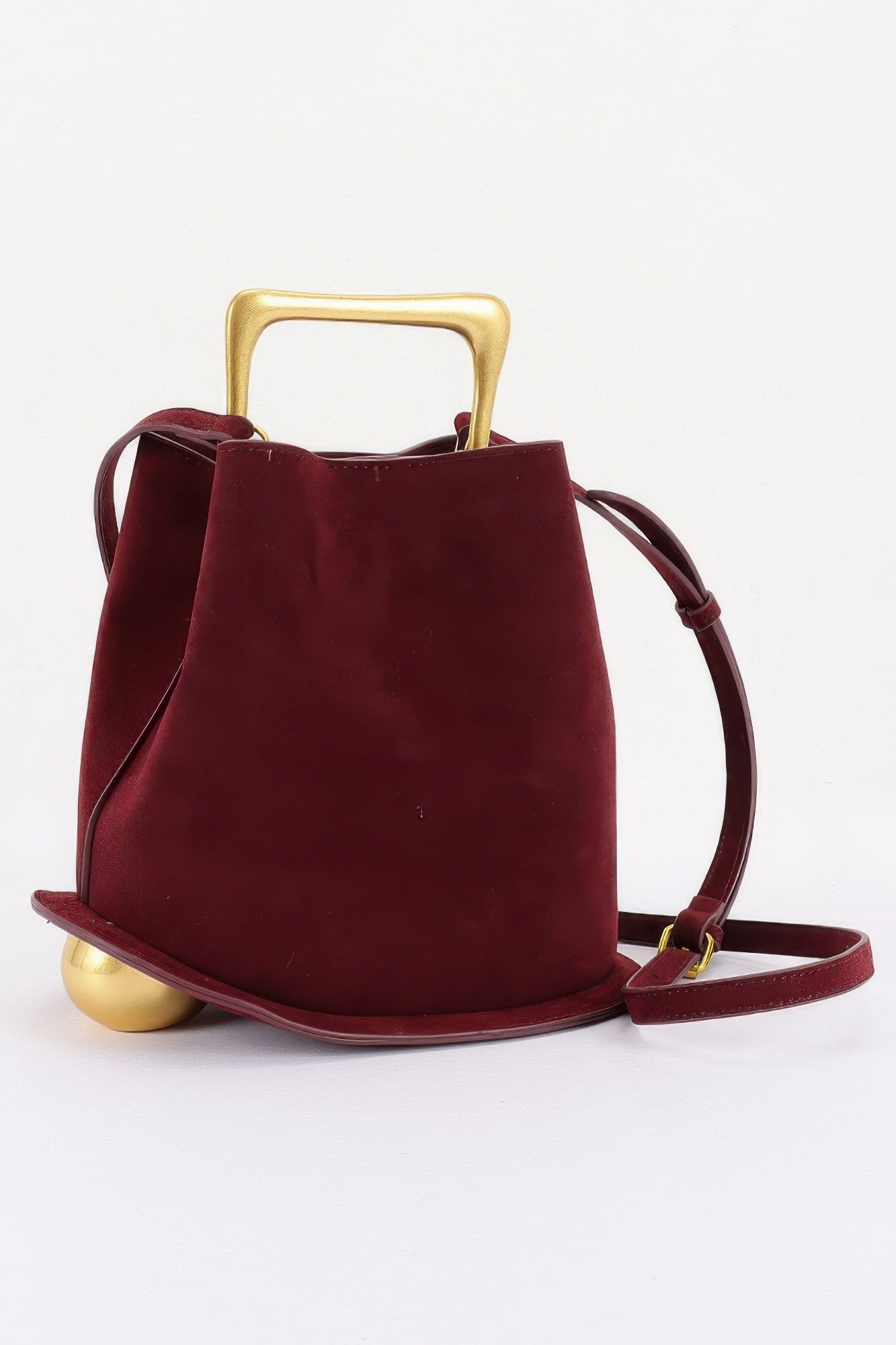 Suede effect metal handle handbag detail view