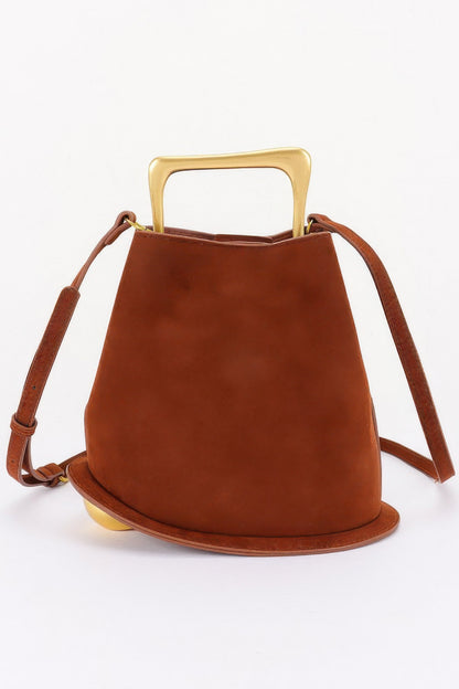 Suede effect metal handle handbag detail view