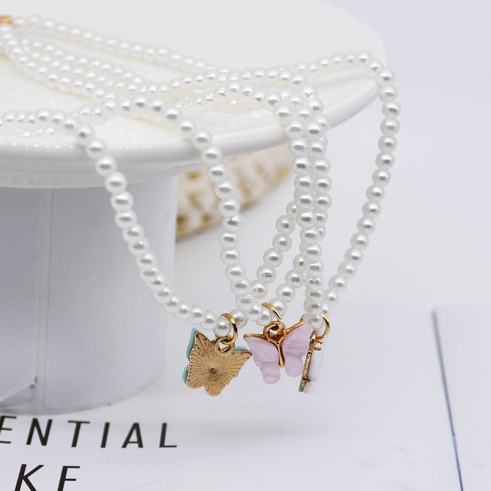 White Pearl Choker Necklace with Butterfly Pendant – Minimal Elegance | The Simple Co – Necklaces (Minimalist / Statement / Unis, minimalist style, quiet luxury aesthetic, modern essential – The Simple Co.