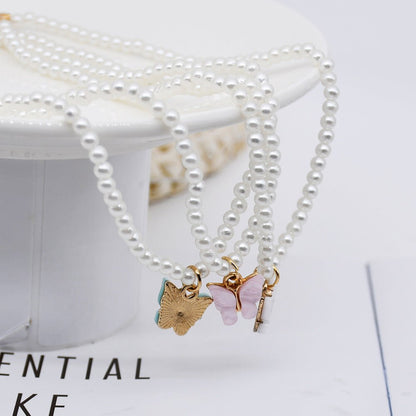 White Pearl Choker Necklace with Butterfly Pendant – Minimal Elegance | The Simple Co – Necklaces (Minimalist / Statement / Unis, minimalist style, quiet luxury aesthetic, modern essential – The Simple Co.